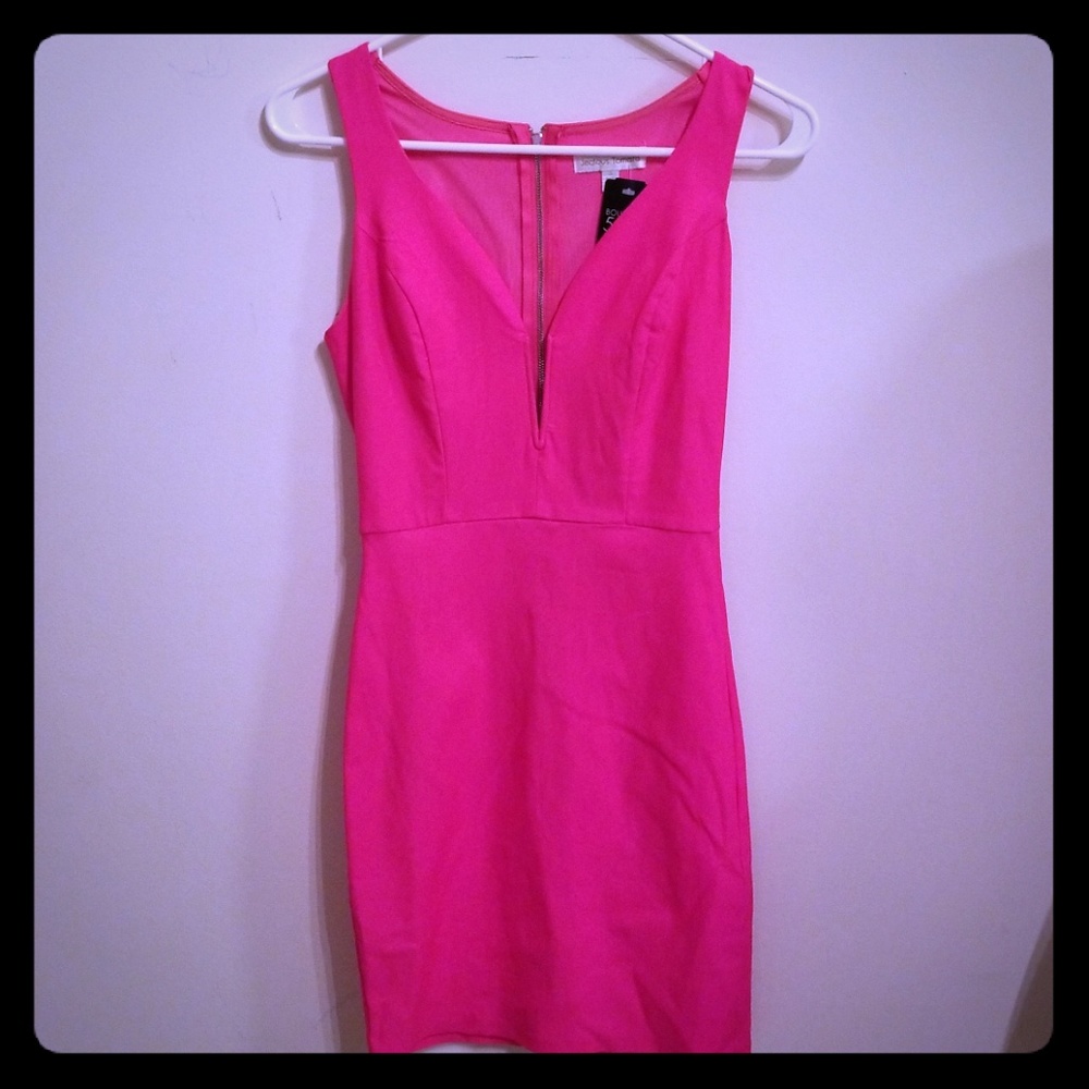 SOLD! pink bodycon mini dress w plunge necklineNWT